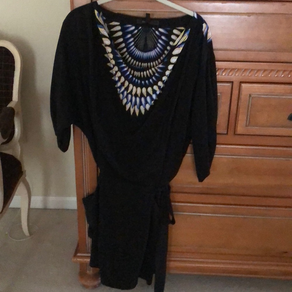 Brand New BCBGMaxazria mini dress with pockets.